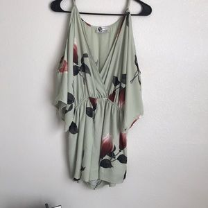 Green romper from a boutique